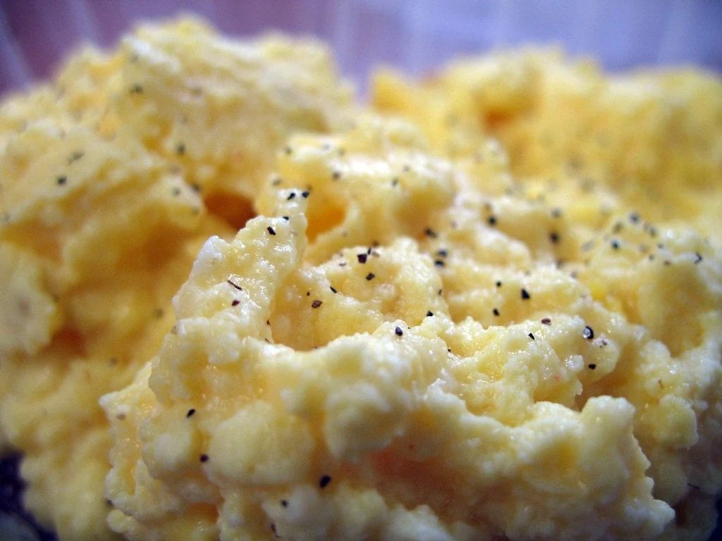 Reheating of the scrambled eggs yellow and creamy scrambled eggs